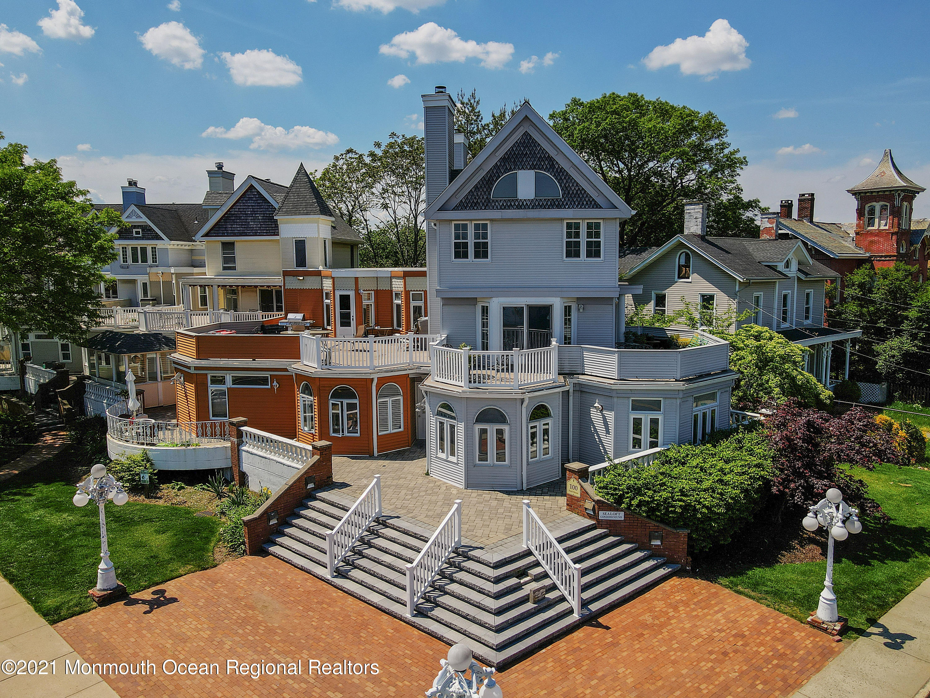100 1st Street, Unit 11 Keyport, NJ 07735 - Photo 21 of 29 a view of multiple houses with a yard