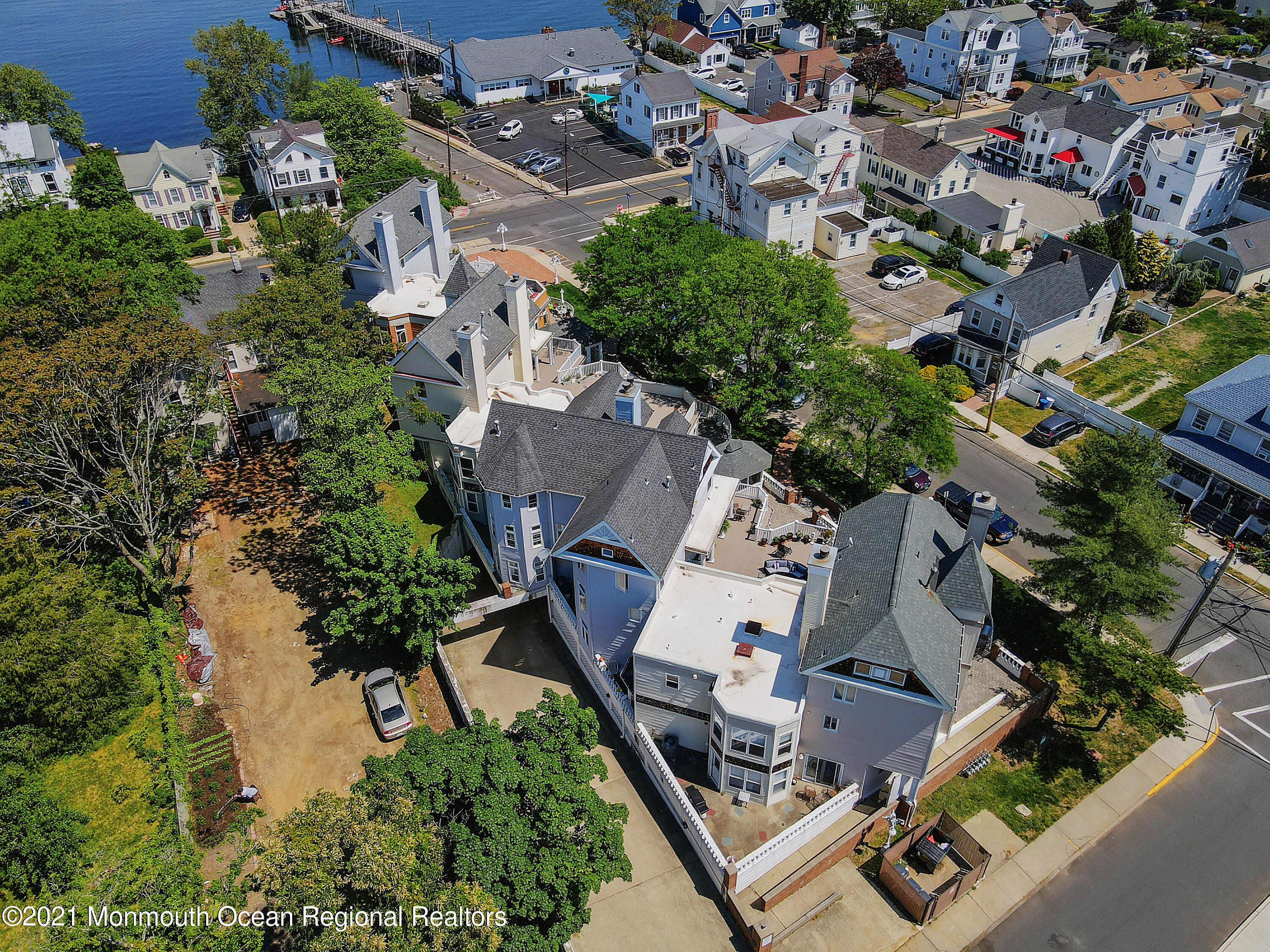 100 1st Street, Unit 11 Keyport, NJ 07735 - Photo 22 of 29 an aerial view of a house with garden space and street view