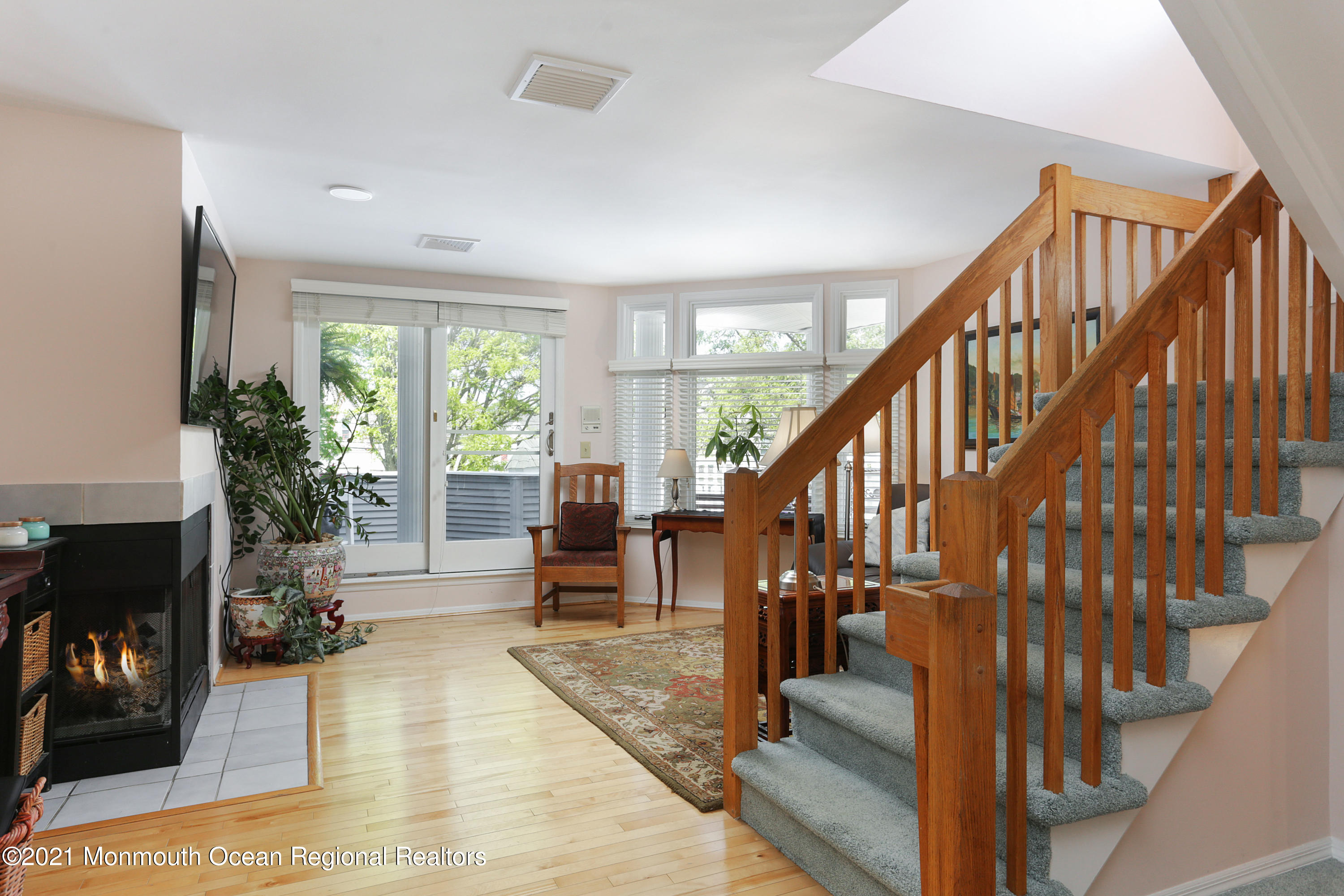 100 1st Street, Unit 11 Keyport, NJ 07735 - Photo 6 of 29 a view of entryway livingroom and hall with wooden floor