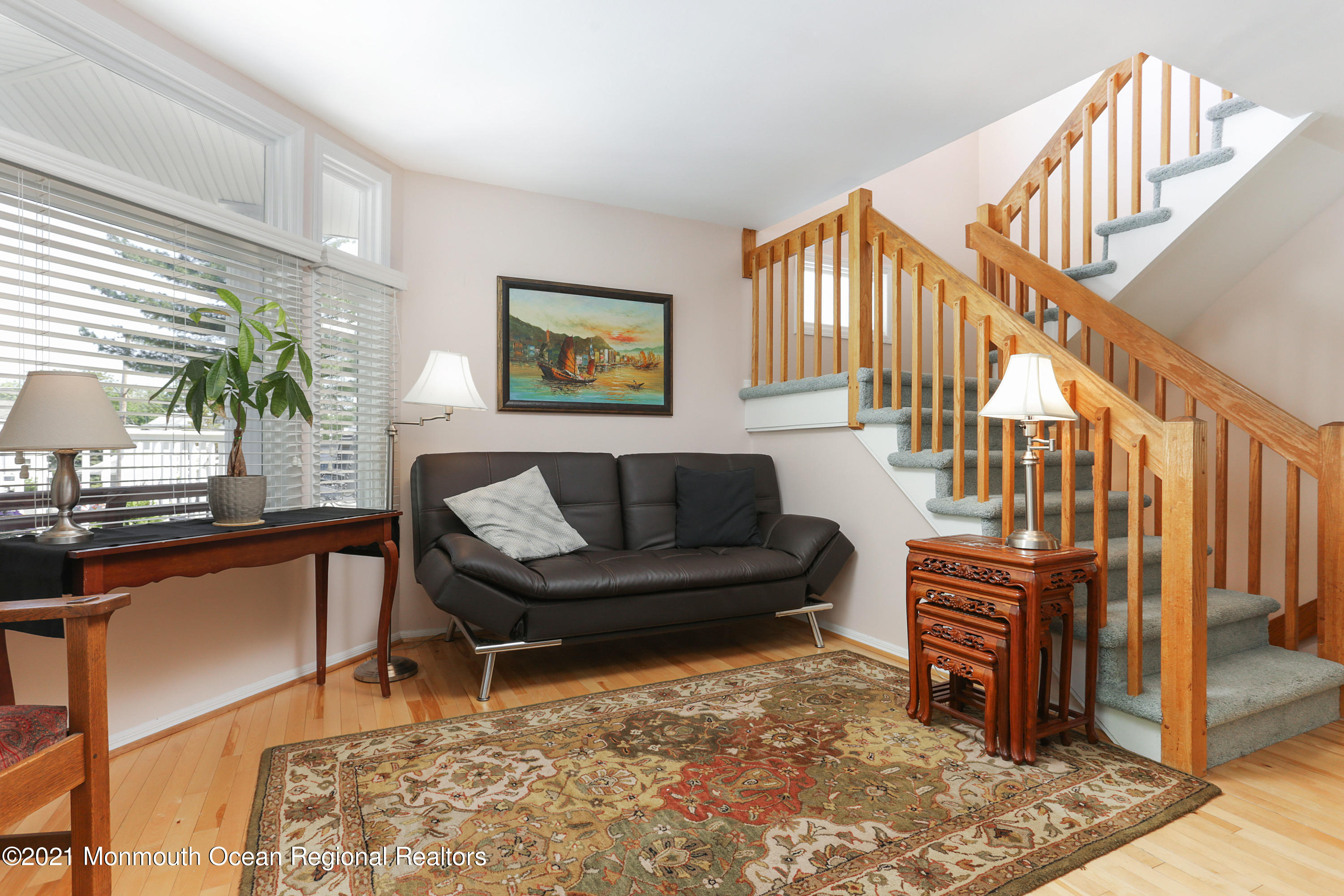 100 1st Street, Unit 11 Keyport, NJ 07735 - Photo 7 of 29 a living room with furniture a rug and a window
