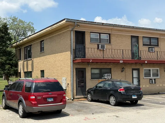 a car parked in front of a house