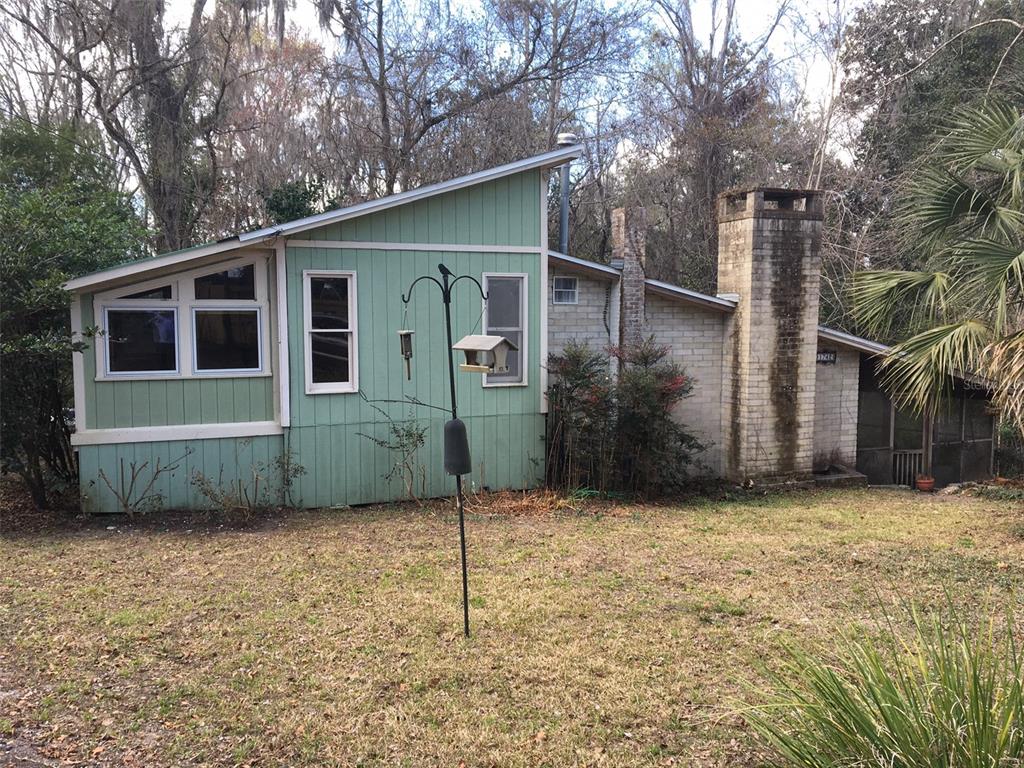 1742 Northwest 12th Road Gainesville, FL 32605 - Photo 1 of 1 Exterior from Driveway