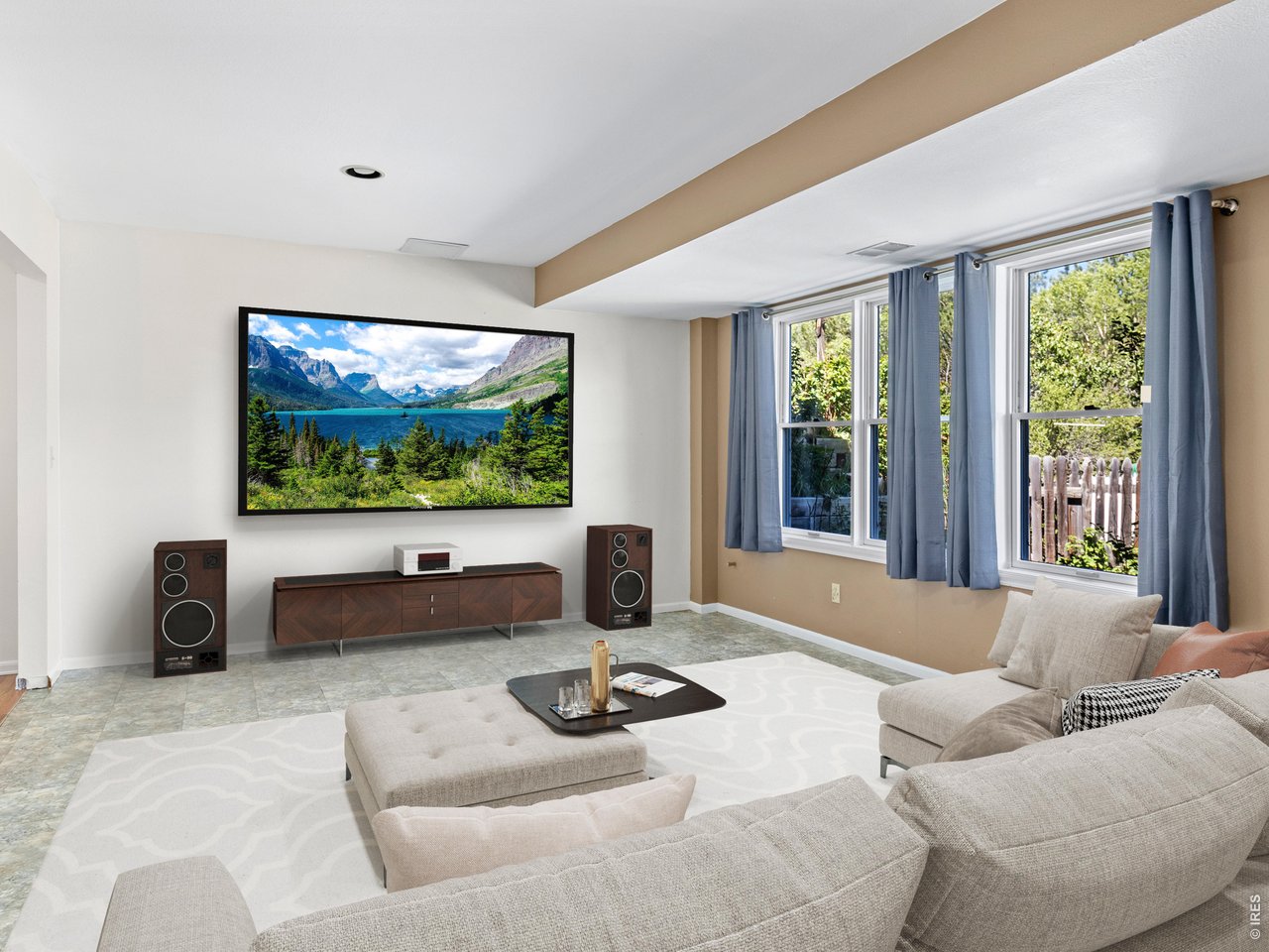 2180 Devils Gulch Road Estes Park, CO 80517 - Photo 33 of 40 Lower level theatre room, digitally staged