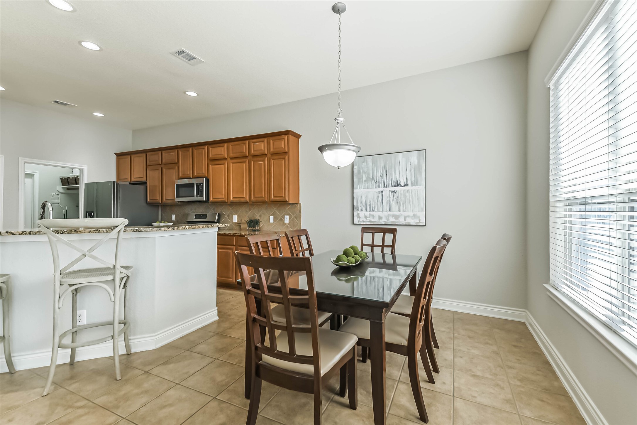 19022 Greenleaf Ridge Court Cypress, TX 77429 - Photo 15 of 47 a dining room with furniture and window