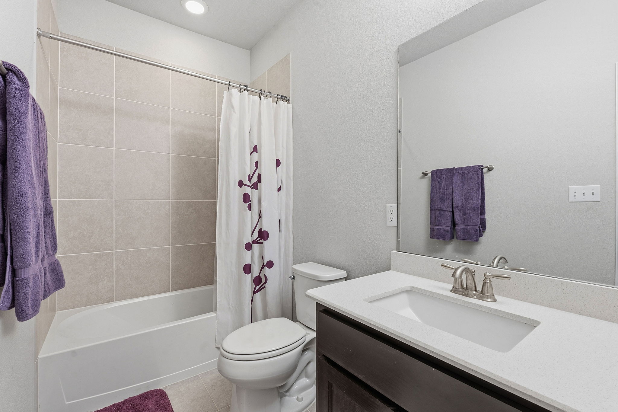 12616 Twisted Root Drive Manchaca, TX 78652 - Photo 26 of 36 The full guest bathroom comes with a shower/tub combo and single vanity.