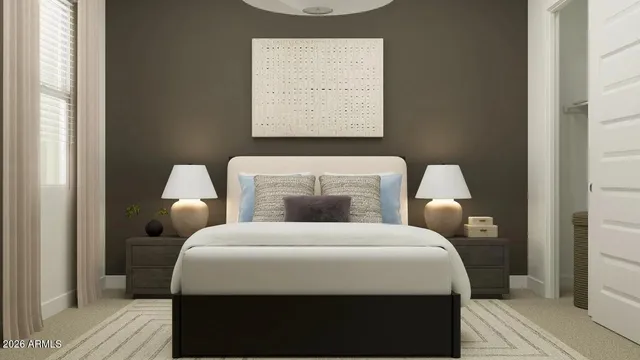 a bedroom with a bed and a mirror