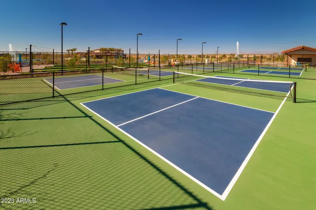 a view of an outdoor space and tennis court