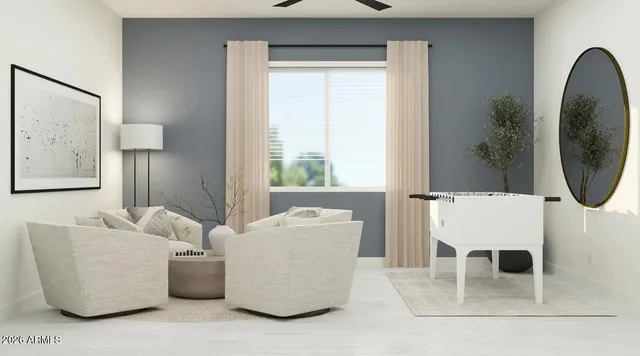 a living room with furniture and a window