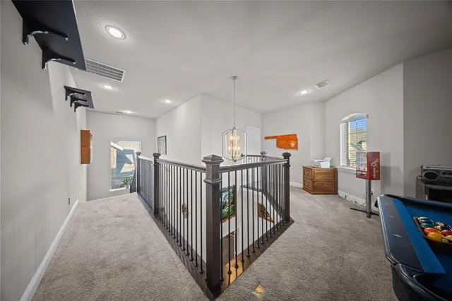 a view of a hallway with workspace