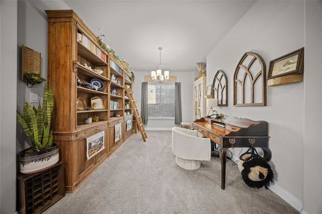 a view of a workspace with furniture