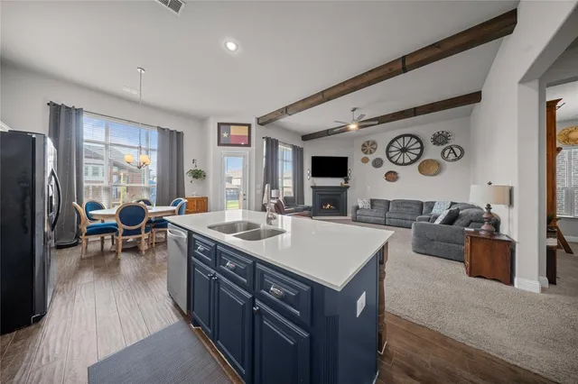 a view of living room with furniture and window
