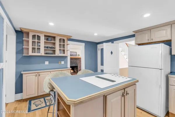 a bedroom with a bed a desk and chair