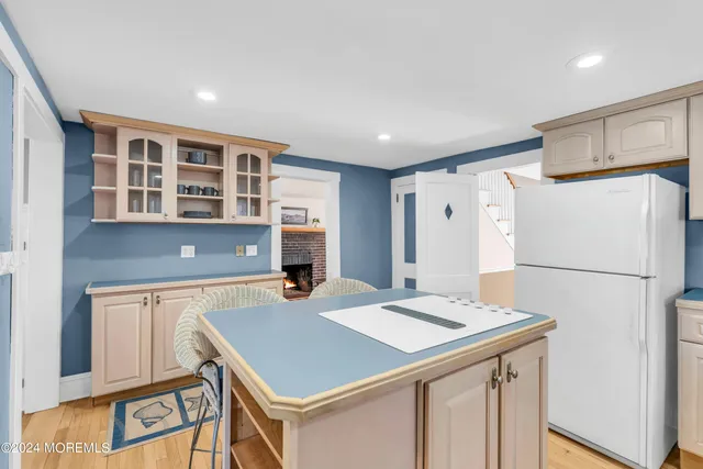 a bathroom with a toilet sink and window