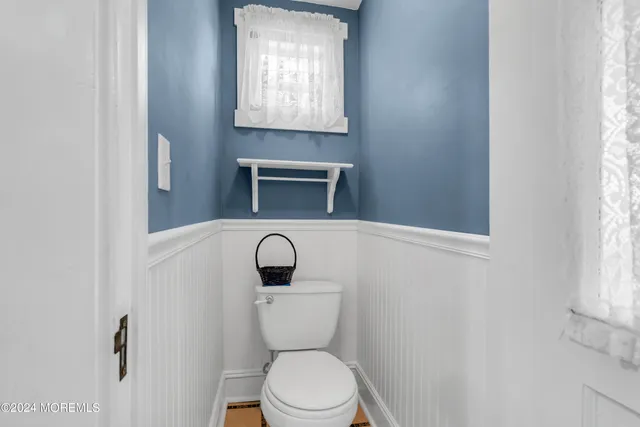 a view of kitchen with furniture and a window