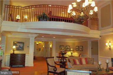 12246 Roundwood Road, Unit 405 Lutherville-Timonium, MD 21093 - Photo 1 of 16 a lobby with furniture and window