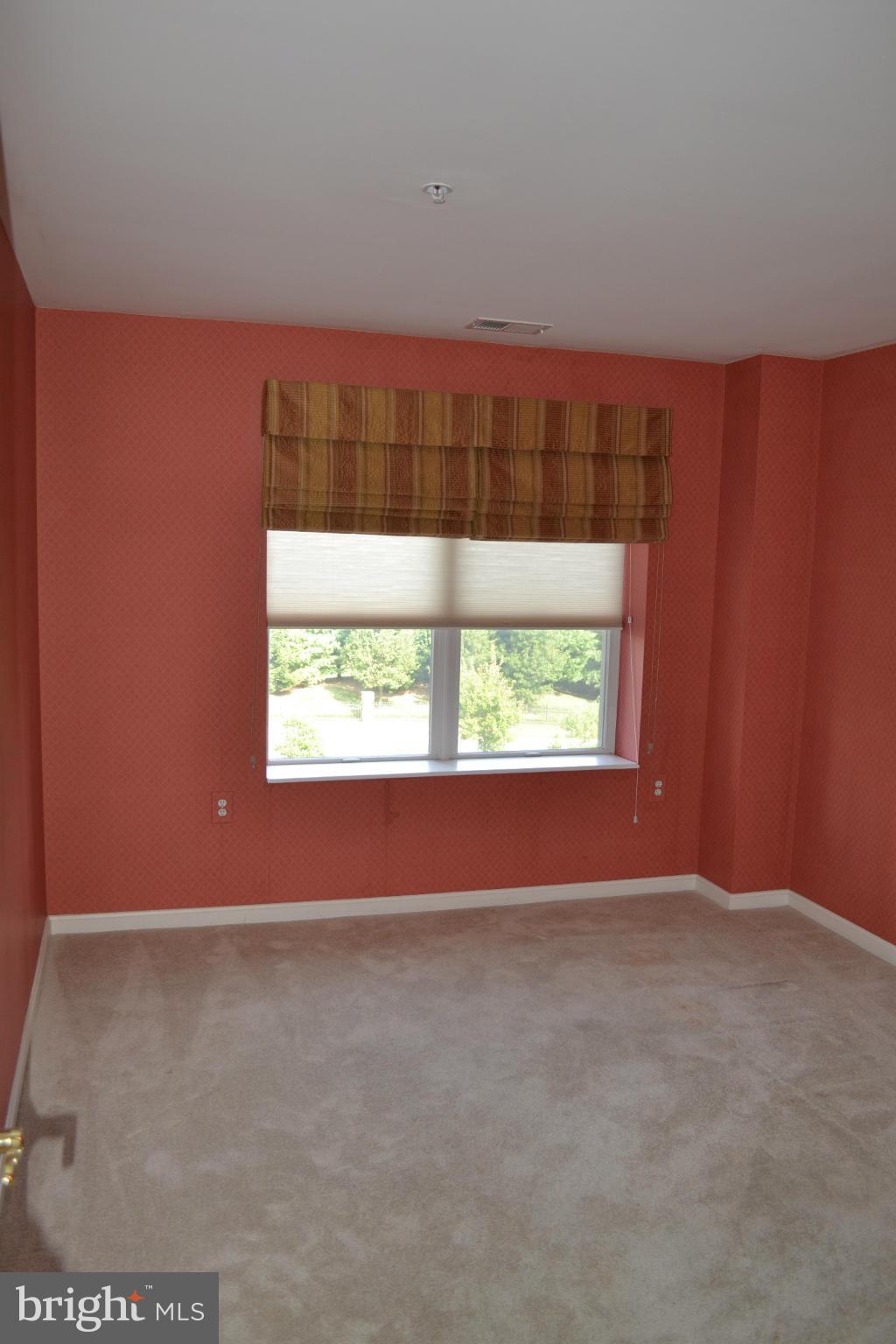 12246 Roundwood Road, Unit 405 Lutherville-Timonium, MD 21093 - Photo 11 of 16 a view of a room with a window