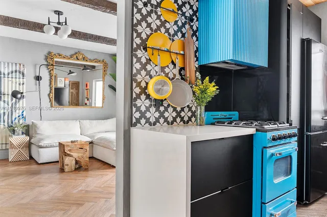 a view of living room with furniture and entryway