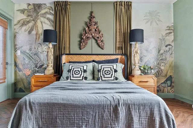 a bathroom with a granite countertop sink a toilet a mirror and shower