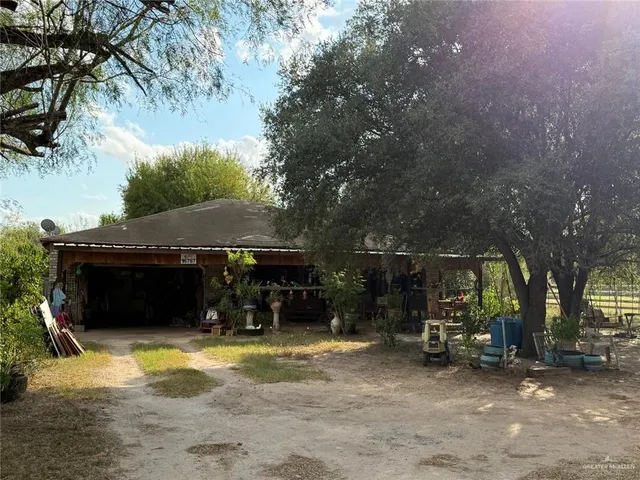 a view of a outdoor space with porch and furniture