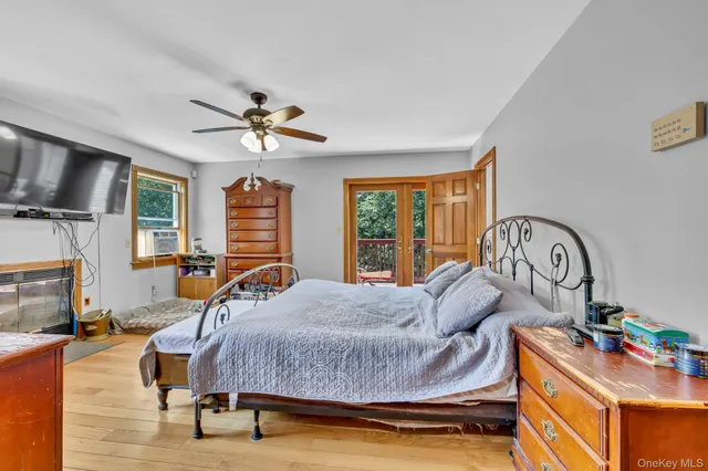 a bathroom with a sink a toilet and shower curtain