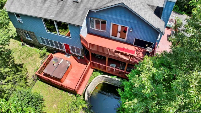 a view of a chair and table in the garden
