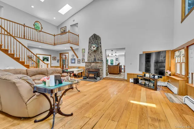 a living room with fireplace furniture