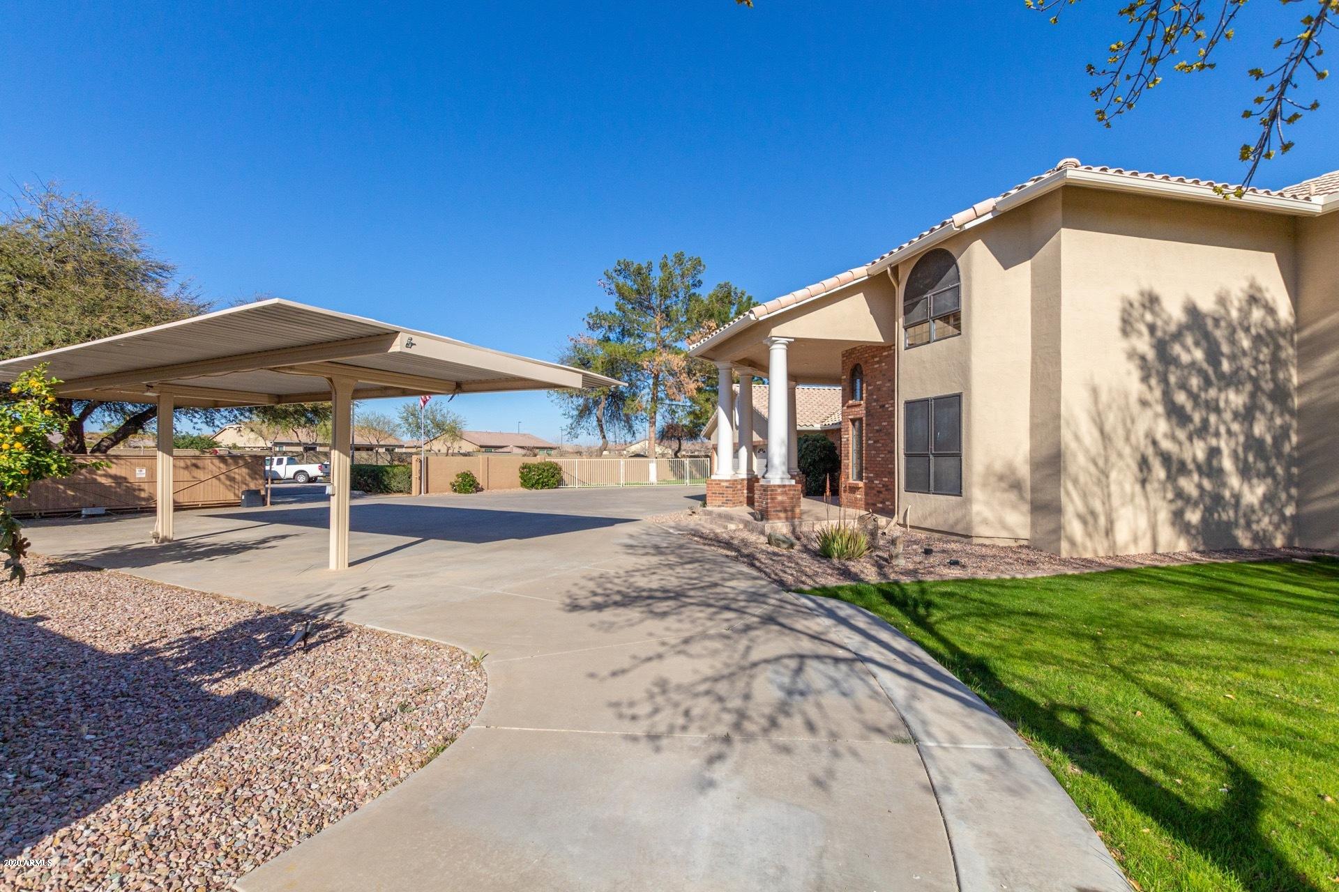 21203 South Lindsay Road Gilbert, AZ 85298 - Photo 49 of 64 Covered parking in front of main house