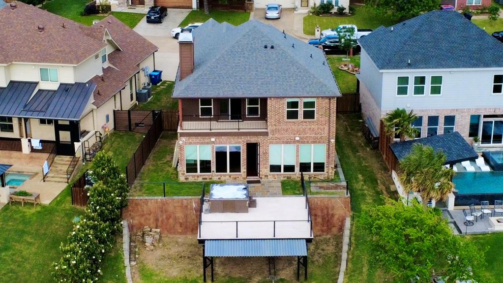 2313 Windjammer Way Rowlett, TX 75088 - Photo 37 of 38 an aerial view of multiple houses with a yard