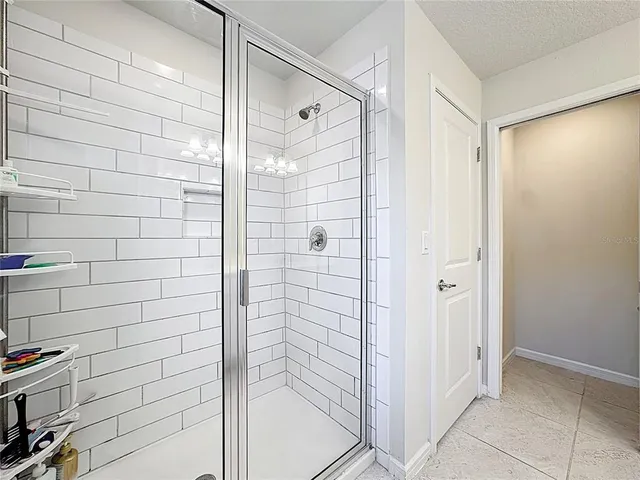 a view of a patio with swimming pool