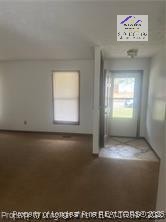 1235 Wilderness Drive Spring Lake, NC 28390 - Photo 2 of 11 an empty room with a window