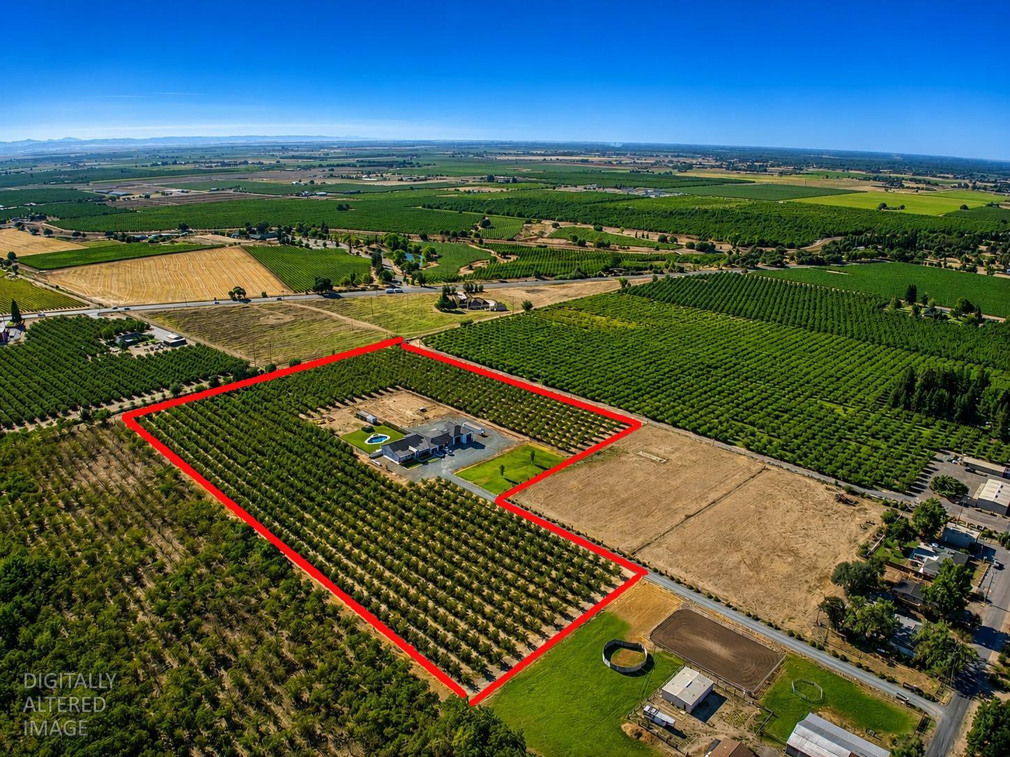 16464 Fox Road Lodi, CA 95240 - Photo 17 of 18 Approximate property boundaries outlined, illustrating the home's private setting, productive almond orchard, and spacious grounds.