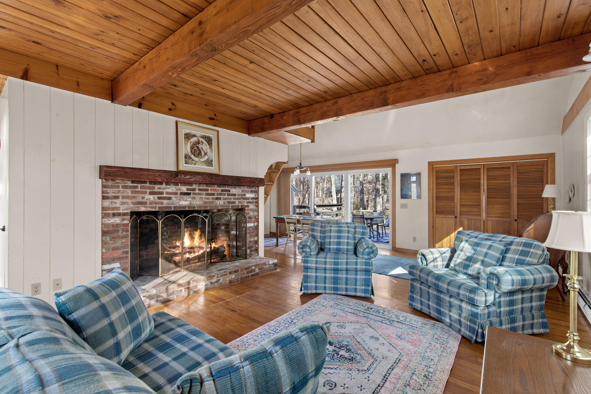 157 Jonathans Way Brewster, MA 02631 - Photo 11 of 38 a living room with furniture and a fireplace