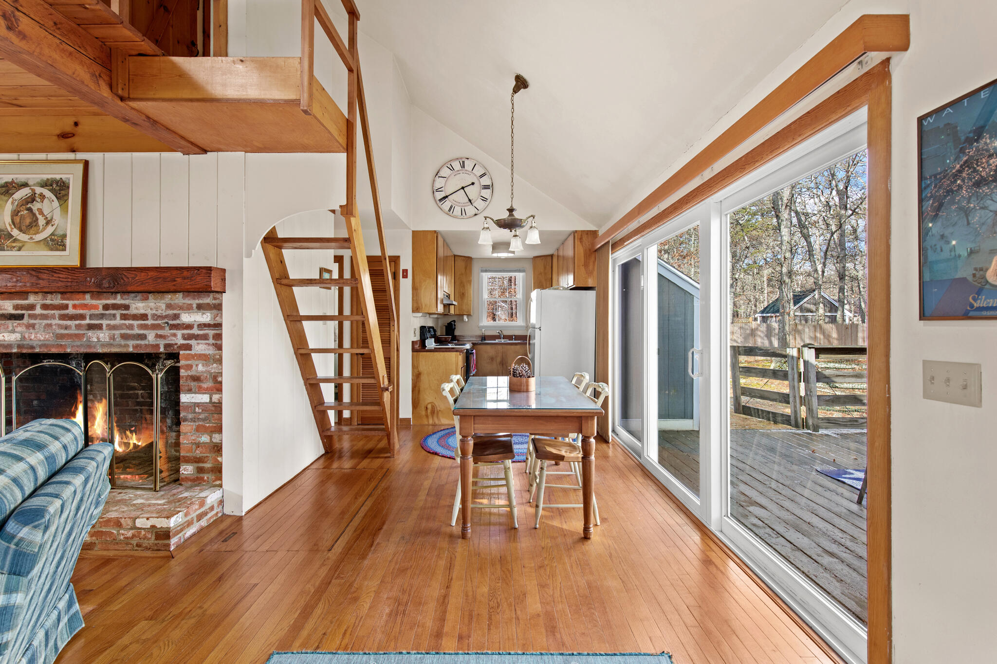 157 Jonathans Way Brewster, MA 02631 - Photo 13 of 38 a view of a dining room with furniture window and wooden floor