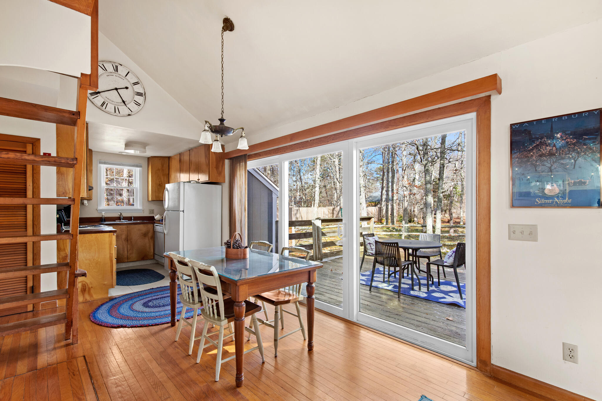 157 Jonathans Way Brewster, MA 02631 - Photo 14 of 38 a view of a dining room with furniture window and wooden floor