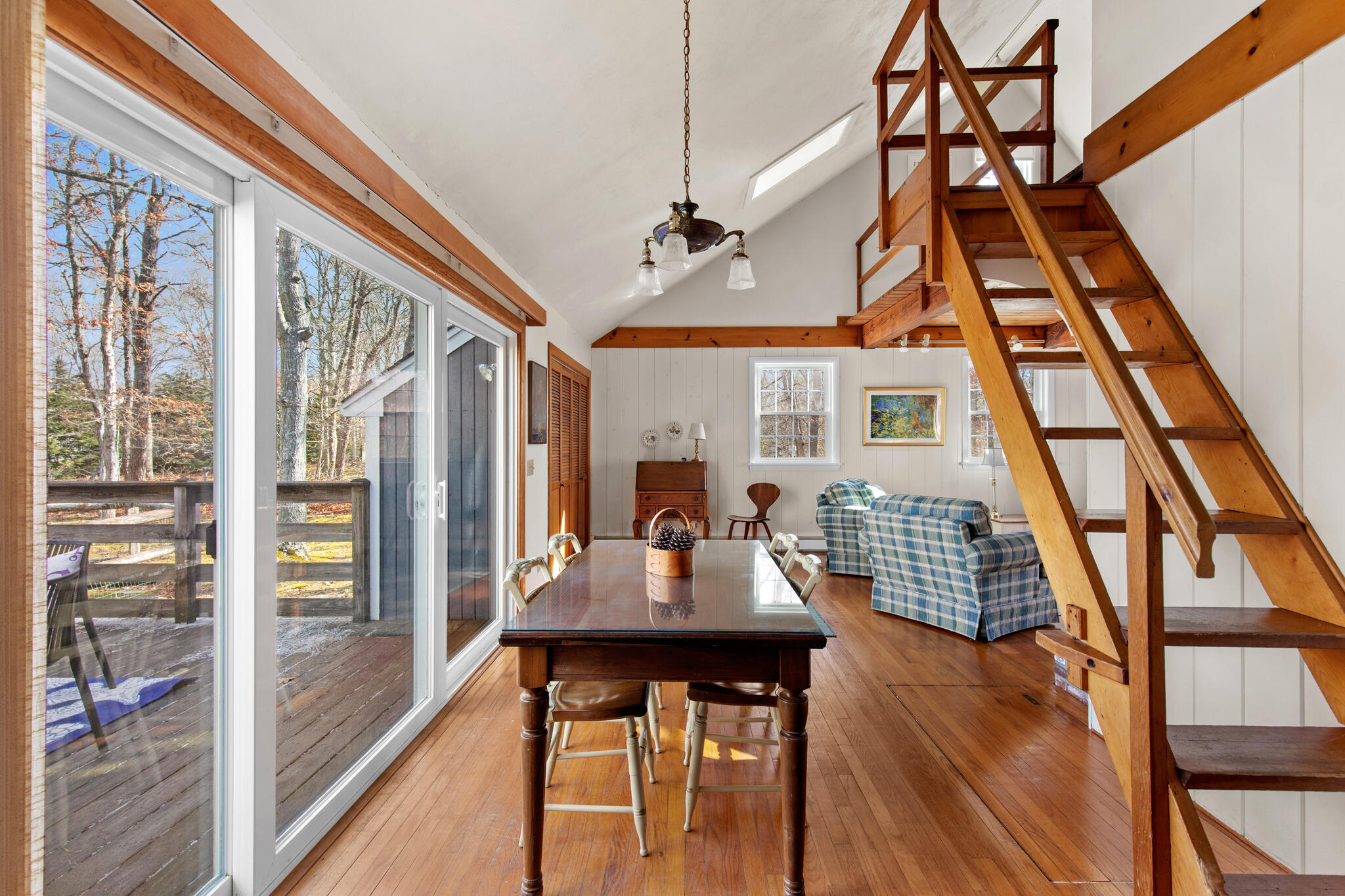 157 Jonathans Way Brewster, MA 02631 - Photo 15 of 38 a view of a dining room with furniture window and wooden floor