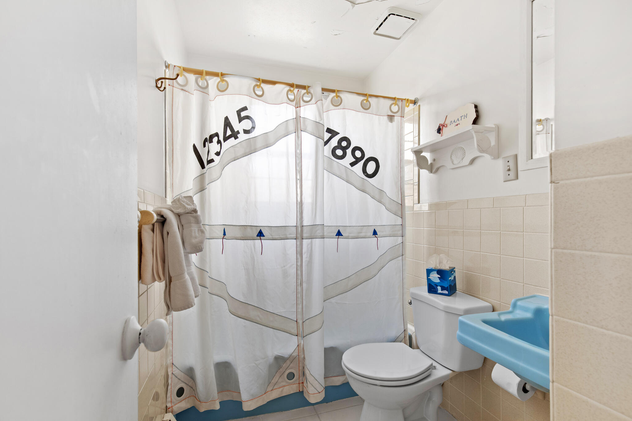 157 Jonathans Way Brewster, MA 02631 - Photo 20 of 38 a white toilet sitting next to a white tub