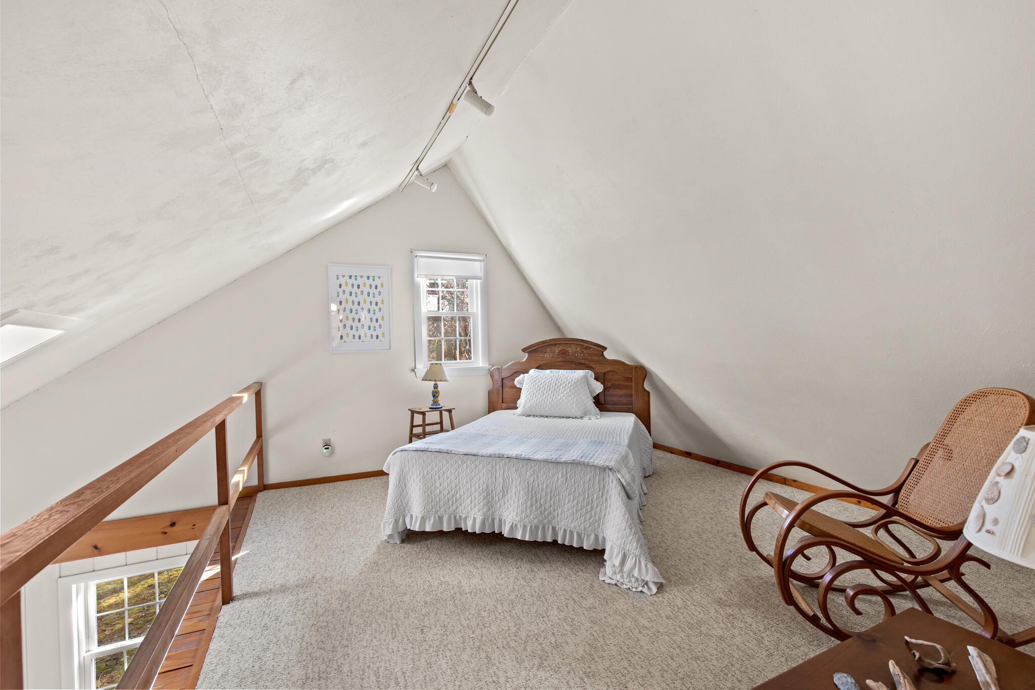 157 Jonathans Way Brewster, MA 02631 - Photo 26 of 38 a bedroom with a bed and a chair