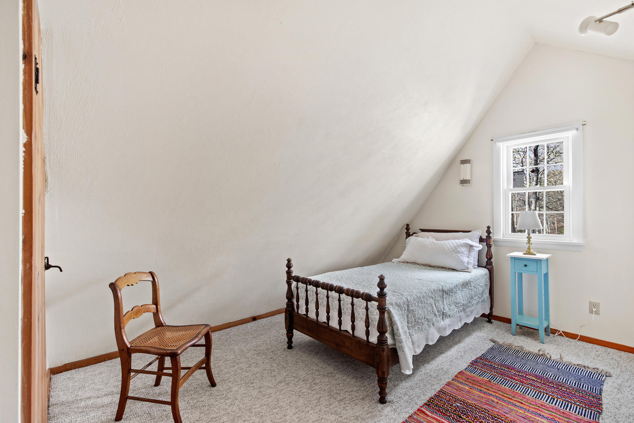 157 Jonathans Way Brewster, MA 02631 - Photo 28 of 38 a bedroom with a bed and chair