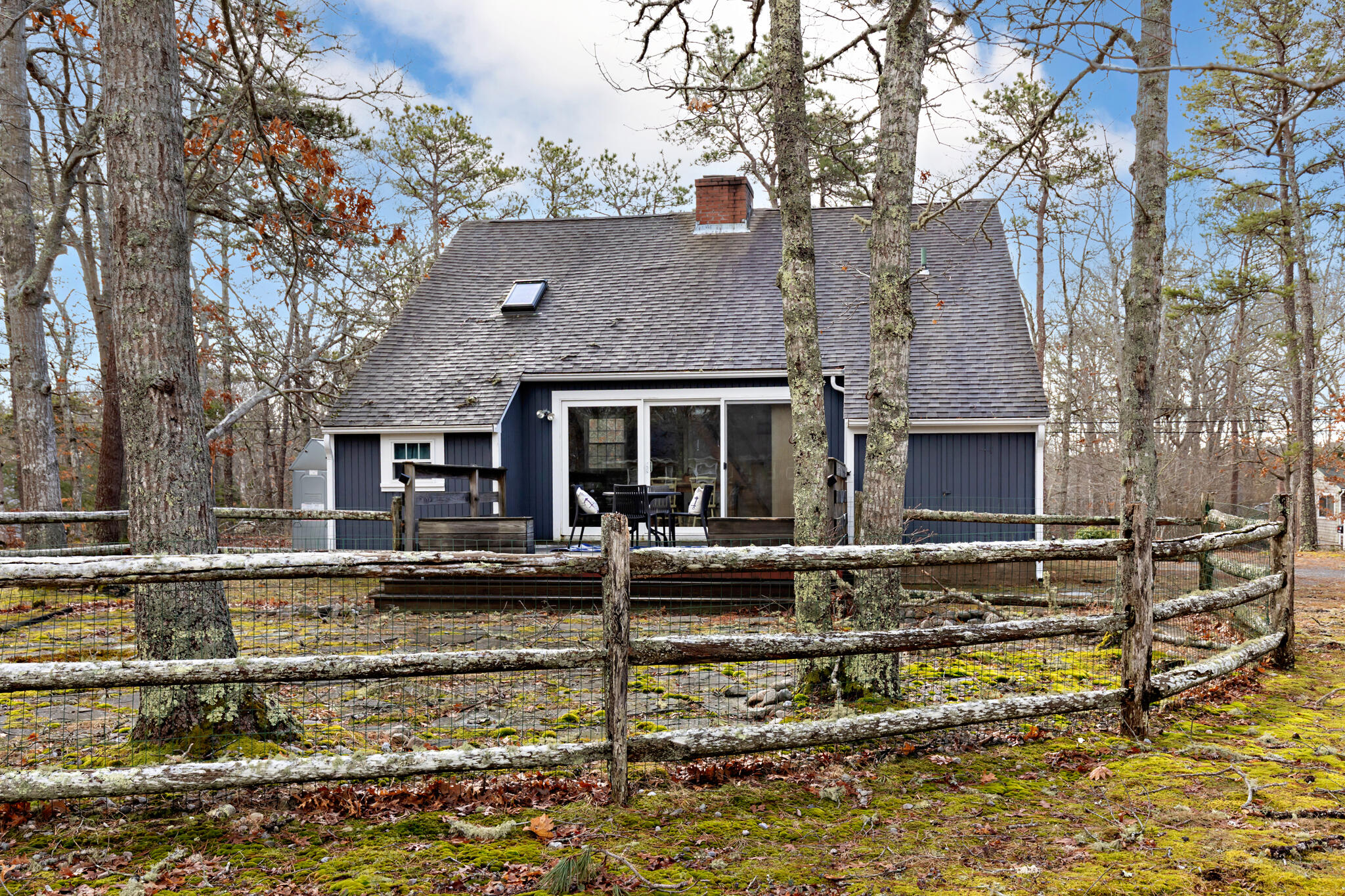 157 Jonathans Way Brewster, MA 02631 - Photo 3 of 38 front view of a house with a yard
