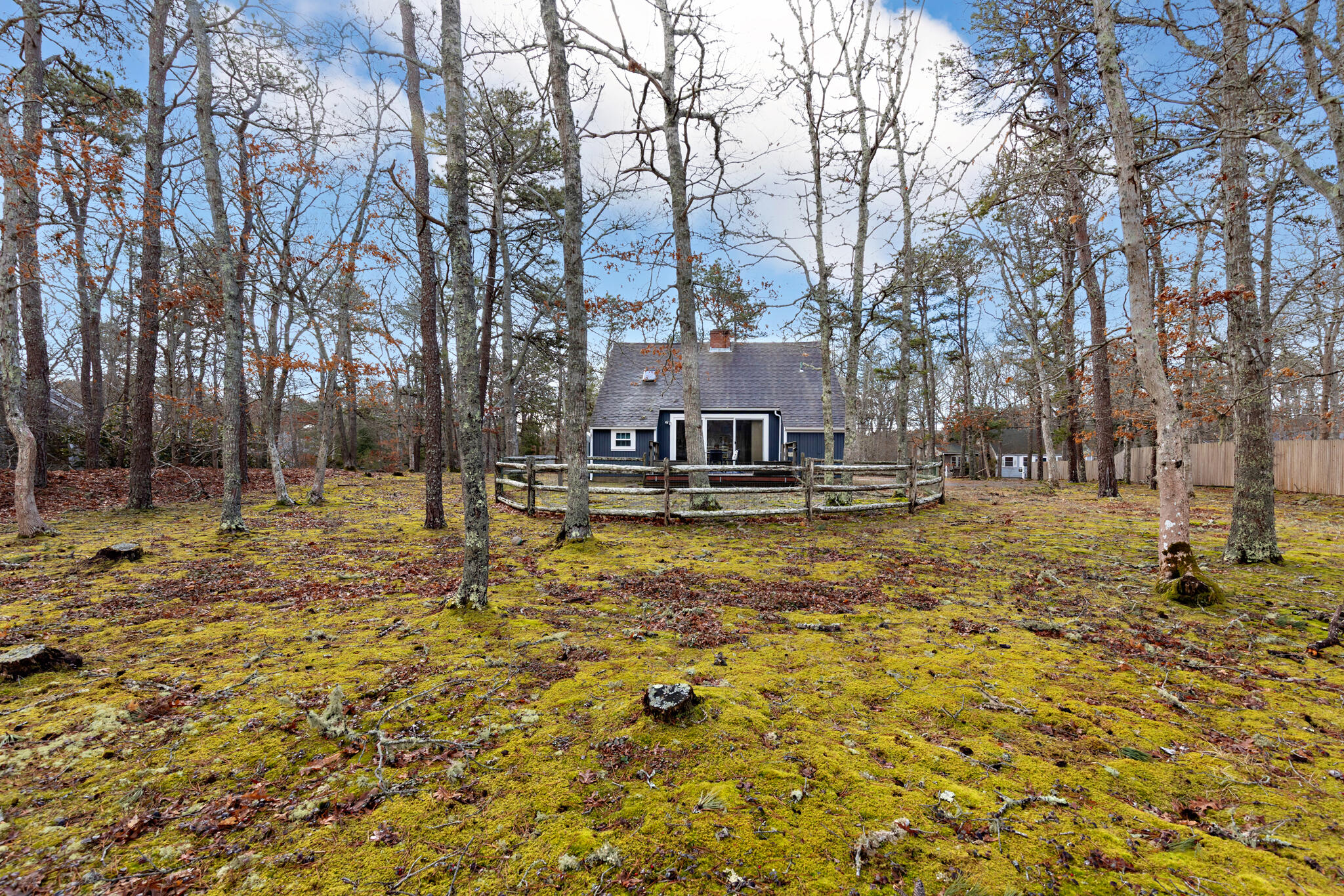 157 Jonathans Way Brewster, MA 02631 - Photo 9 of 38 a swimming pool with trees in the background