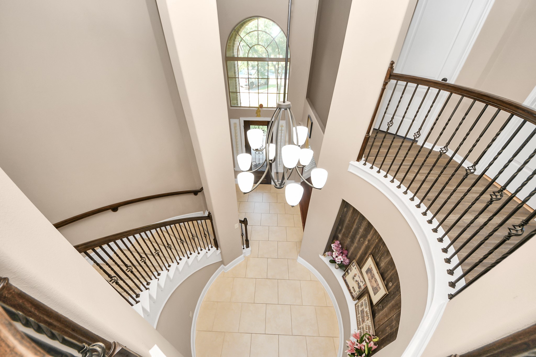 a view of a balcony with wooden floor