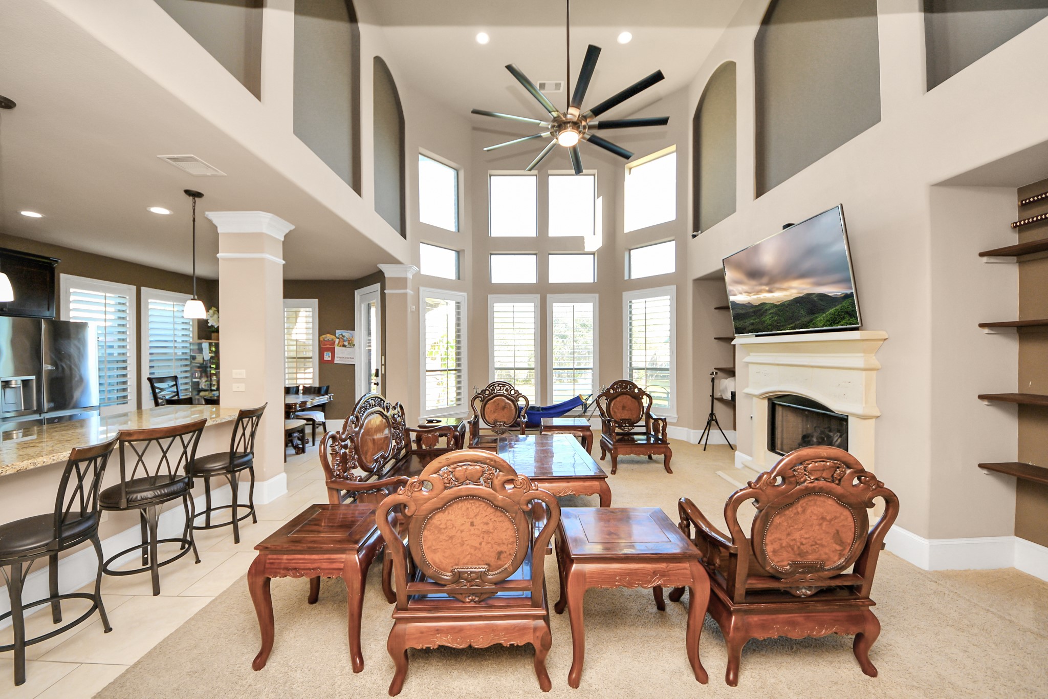8447 Roland Canyon Drive Cypress, TX 77433 - Photo 12 of 41 a living room with furniture fireplace and a large window