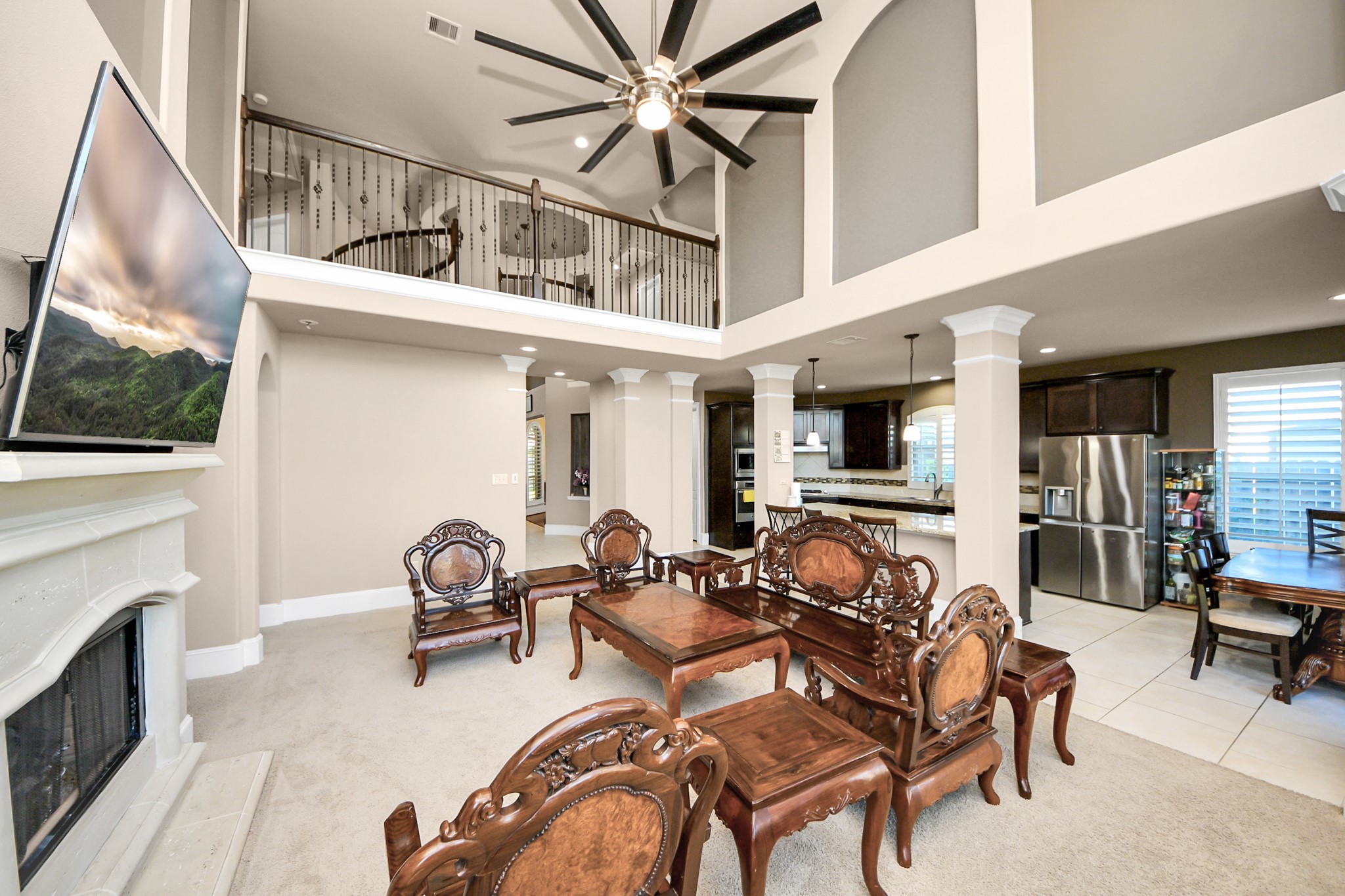 8447 Roland Canyon Drive Cypress, TX 77433 - Photo 14 of 41 a view of a livingroom with furniture and a flat screen tv