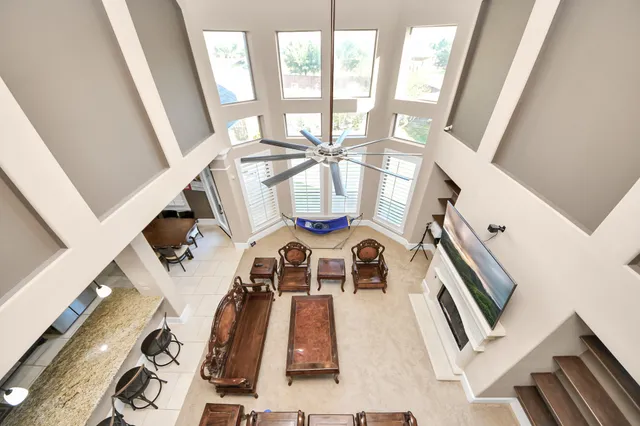 a view of living room with furniture and fireplace