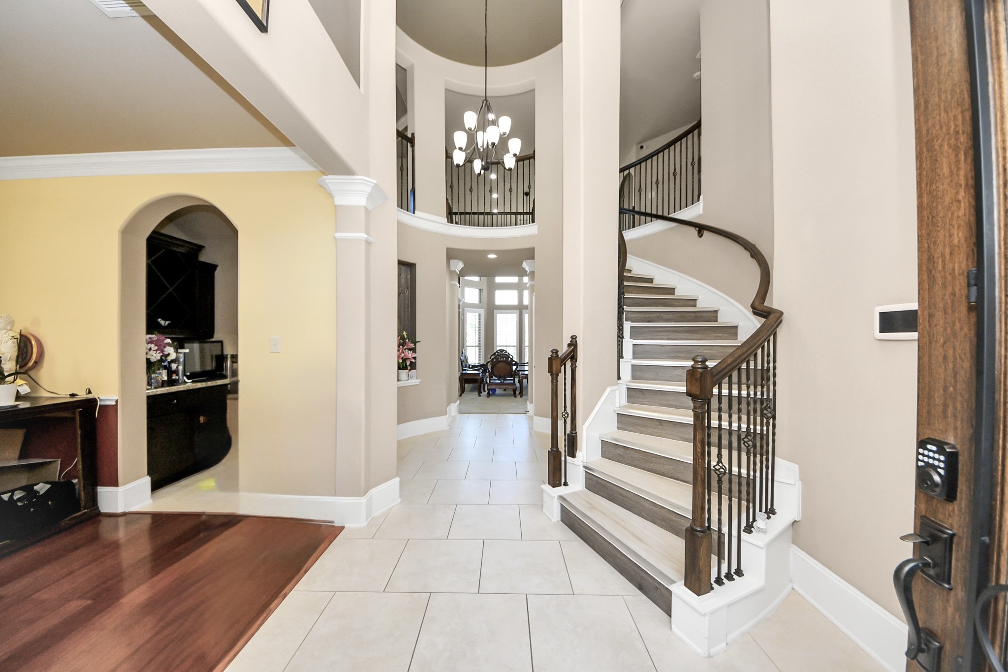 8447 Roland Canyon Drive Cypress, TX 77433 - Photo 4 of 41 a view of entryway and hall with wooden floor