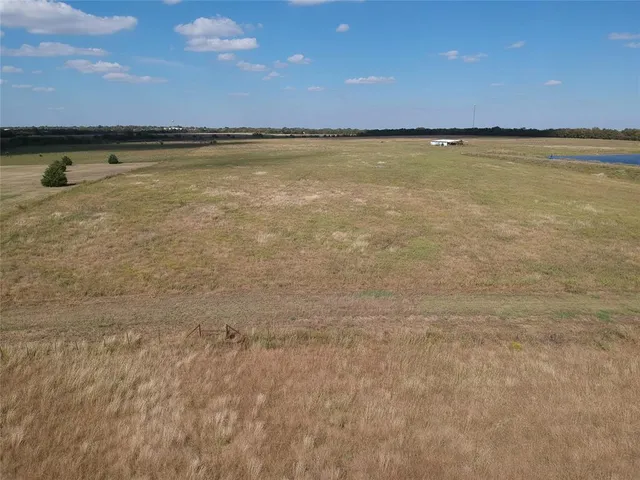 a view of a lake with beach