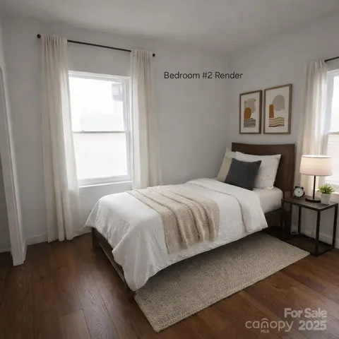 a bedroom with a bed wooden floor and window