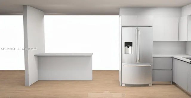 a kitchen with a stove and a microwave