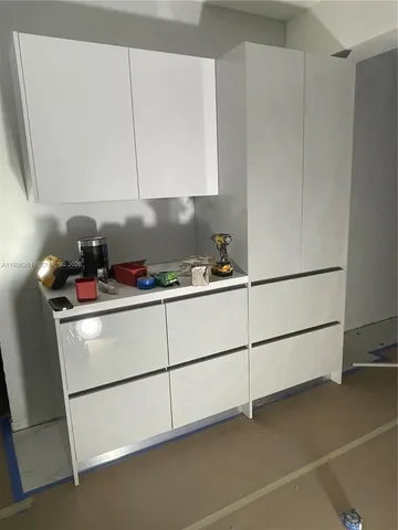 a room with storage and utility