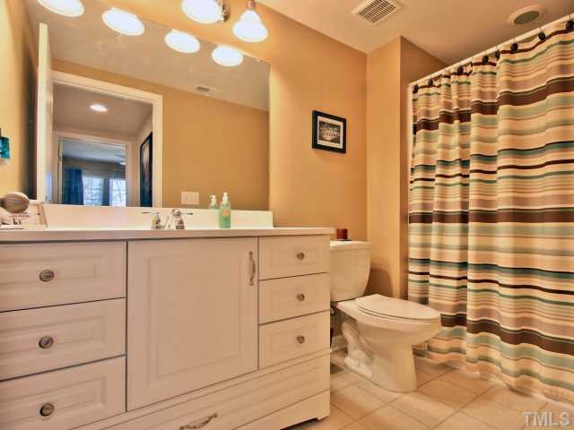 7807 Snow Heights Lane Raleigh, NC 27613 - Photo 18 of 21 Full bath in the basement.
